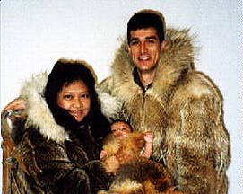 Judy (Bautista '74) Mahi with husband Lahsen and baby