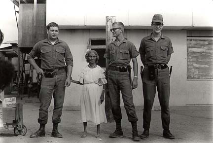 American soldiers and the Queen of the Negritos, Clark Air Force Base - click here to view higher resolution image